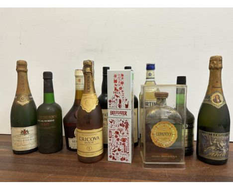 A selection of mixed spirits to include Champagne Millesim 1990, Beefeater Gin, Port, MartiniLocation:If there is no conditio