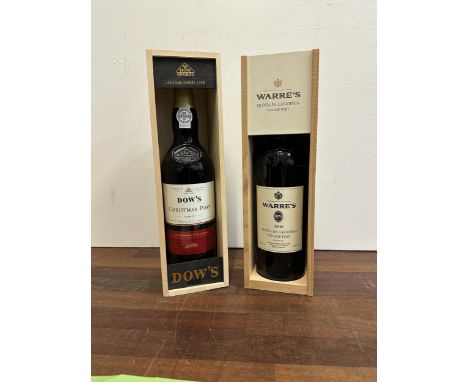 A cased bottle of Warres 2006 Vintage Port and a cased bottle of Dow Christmas PortLocation:If there is no condition report s