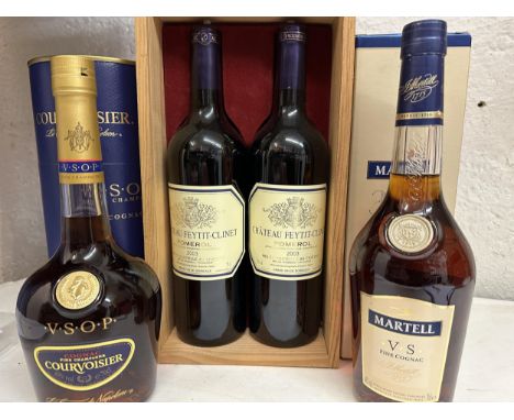 Two cased bottles of Chateau Feytit-Clinet Pomerol 2003, one bottle of Courvoisier VSOP Cognac 70cl and one bottle of Martell