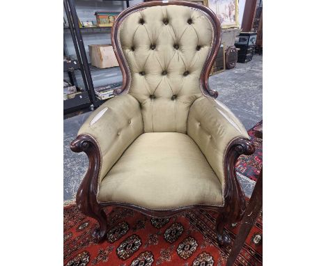 A pair of victorian style show frame button back chairs.