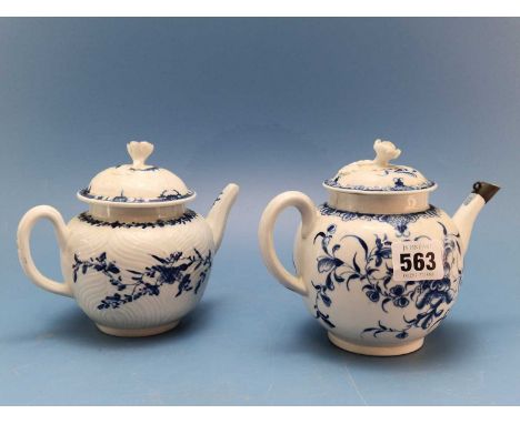 An 18th century Worcester blue and white teapot and cover, another tea pot and two covers, all painted with flowers