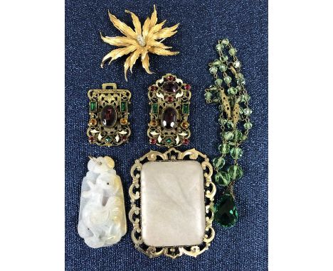 A Boucher costume brooch, a vintage hardstone in a brooch frame, an enamel and stone set gilded buckle, a multi-facet necklac