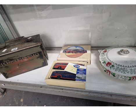 An ammunition box, two Corgi buses in a common box and a Cauldon vegetable tureen