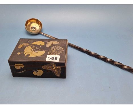 A 19th century toddy ladle centered with glass disk and a Japanese lacquered small box