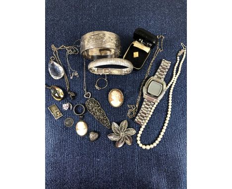 A hallmarked silver flat link bracelet, a Chester hallmark bangle, an 800 stamped cameo brooch and similar pendant, a Casio W