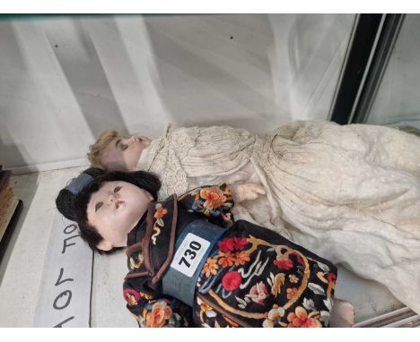 A Simon and Halbig bisque headed doll together with a Chinese doll