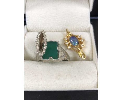 A brutalist-style silver ring, dated 1977 sponsor mark Gx and a costume opal pendant. 