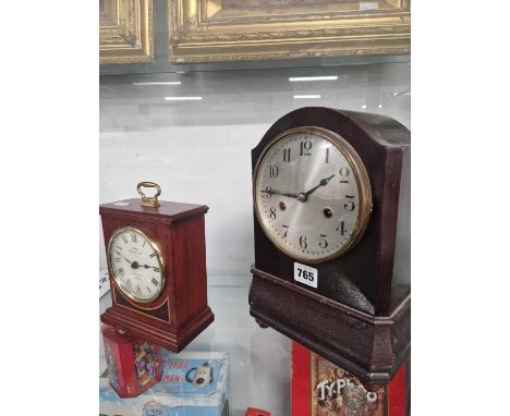 A mid 2oth century mahogany mantel clock striking on a coiled rod together with a battery driven mantel clock
