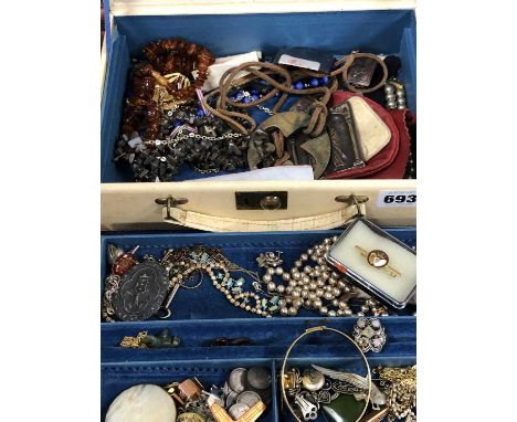 A vintage jewellery box and its contents include a 1/5th 9ct rolled gold bangle, rosary beads, coins, religious plaques, bead