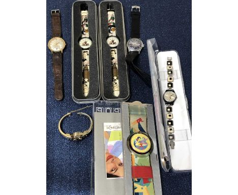 Two Swatch watches, Hawaiian Pacific and Chessboard, a Wallace and Gromit watch, a vintage Timex, and two others.