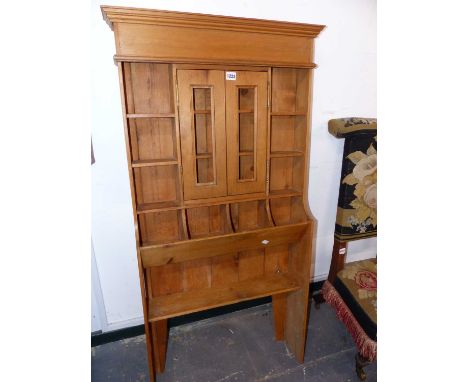 A small pine shelf unit. 