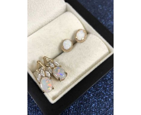 Two pairs of 9ct hallmarked gold opal earrings. Gross weight 4.17 grams. 