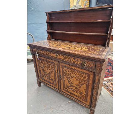 A floral marquetried mahogany dresser, the two shelf back over an apron drawer and two doors enclosing shelves.   W 129 x D 5
