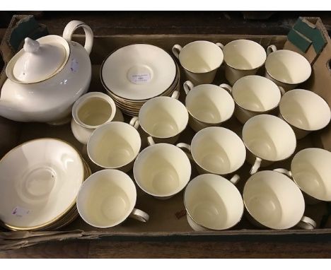 A late 20th century part Royal Doulton tea set, Heather pattern, comprising 15 cups, 15 saucers, sugar bowl, teapot in cream 