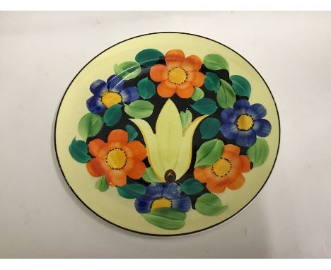 A Susie Cooper for Grays Pottery, a circa 1928 Art Deco plate decorated with a tulipDiameter 25.5cm