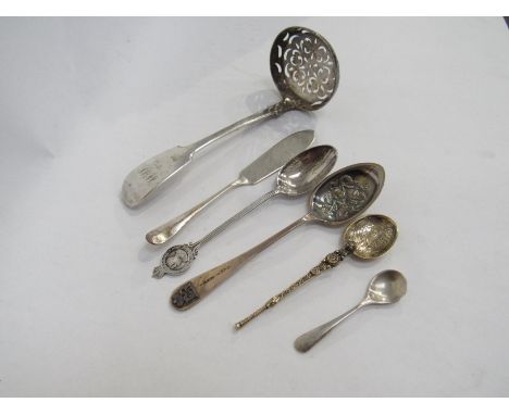 A Victorian silver "Fiddle" pattern sifter ladle, London 1850 and five other silver spoons and butter knives etc, 108g