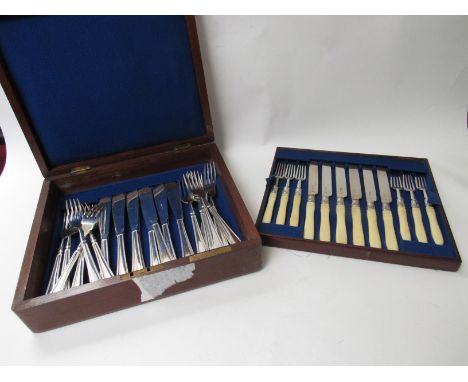 A set of silver bladed fruit knives and fork, London, William Hutton &amp; Sons Ltd., and a plated fish knife and fork set ma