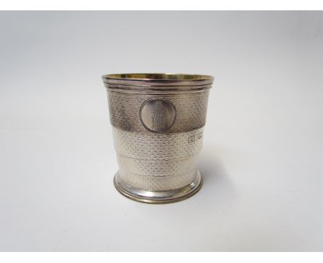 A silver Thomas Johnson telescopic beaker with engine turned detailing, crested and monogrammed, London 1868, 6.5cm tall, 97g