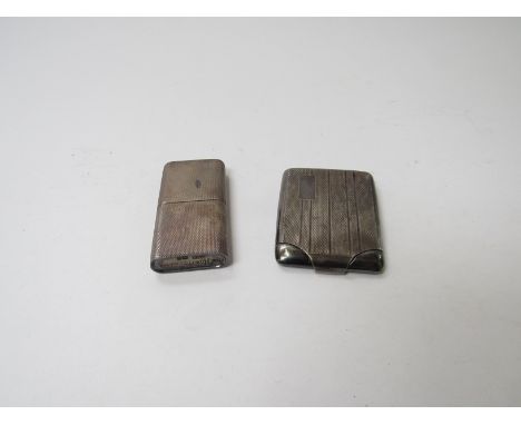 A silver Howitt lighter, Sheffield 1945, a silver match case, Birmingham 1930, both with engine turned decoration (2), 88g