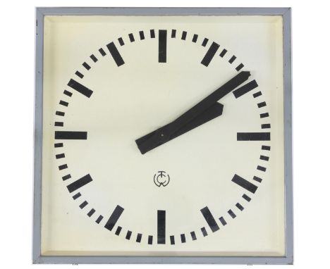 Electric 12" square wall dial bearing the makers logo TCW, within a light grey metal casing 