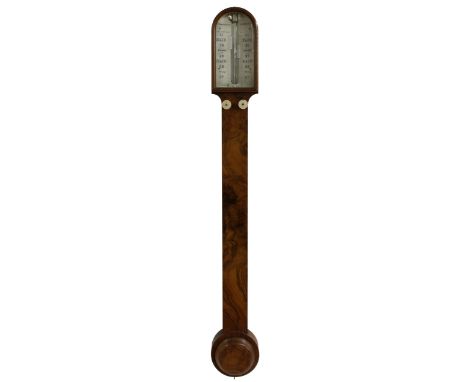 Walnut stick barometer, the angled scale signed V. Somalvico & Co, London, over a flat trunk and circular cistern cover 