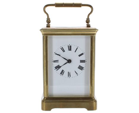 Carriage clock timepiece striking on a gong, within a corniche brass case, 6" high (key) 