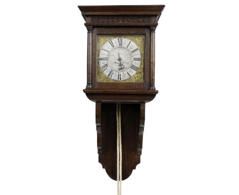 Oak hooded single train wall clock with alarm, the 7.25" square brass dial signed William Wilkins, Devizes to the foliate eng