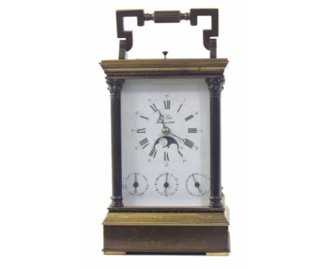 Good repeater calendar carriage clock with alarm, striking the hours and half hours on a gong, the dial and movement back pla