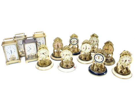 Nine small Aug. Schatz &amp; Sohne eight day mantel clock&nbsp;timepieces,&nbsp;eight with domes, each 6.25" high overall; al