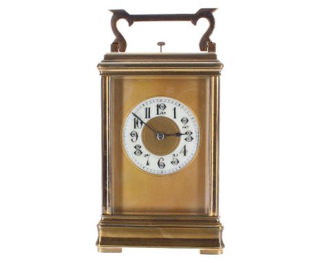 Good French repeater carriage clock striking on a gong, the movement back plate stamped Paris over the maker's trademark logo