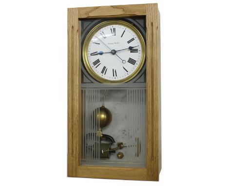 Electrique Brillie electric wall clock, the 6" white dial with centre seconds, within a frosted lined glazed light oak case w