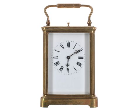 Grande Sonnerie carriage clock striking on a gong, fitted with a selection lever beneath the base, within a corniche brass ca