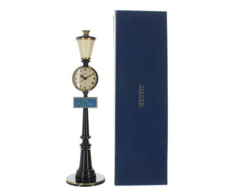 Jaeger novelty clock timepiece in the form of a lamp post, the 1.75" cream dial under an opaque glass shade and above a sign 