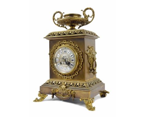 French brass two train ornate mantel clock, the Vincenti movement striking on a bell, the 4" silvered dial with raised Roman 