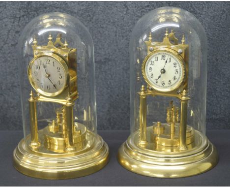 Gustav Becker torsion mantel clock,&nbsp;the 2.75" silvered dial and movement over a disc pendulum and supported upon circula