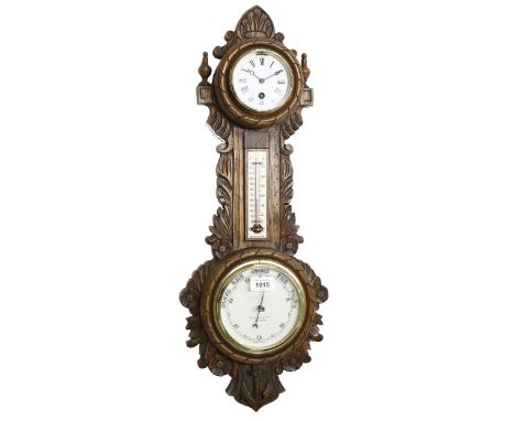 Oak cased clock/barometer and thermometer, the principal dial signed Maple &amp; Co Ltd, London, Patent no. 16538, within a f