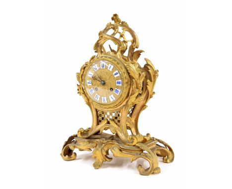 French ormolu two train mantel clock, the Japy Freres movement with outside countwheel striking on a bell, the 3.75" foliate 