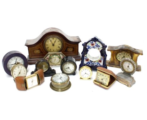 Small mahogany and inlaid mantel clock timepiece, within a wavy rounded arched case, 6.75" high; also twelve other various bo