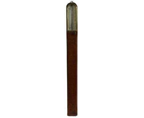 Oak stick barometer, the angled scale signed T.B. Winter, Optician, Newcastle on Tyn, corrected for capacity no. 1315, over a