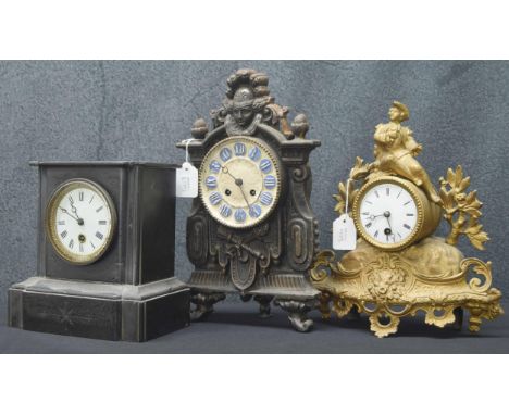 Interesting Continental cast iron two train mantel clock striking on a bell,&nbsp;13.75" high; also a gilded spelter drumhead