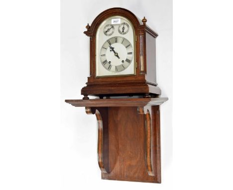 German mahogany ting-tang mantel clock and associated wall bracket, the W &amp; H movement striking on two gongs, the 6" silv