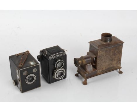 D.R.G.M. tin plate magic lantern, 18.5cm long, together with a Brownie camera and a Lubitel camera (3)