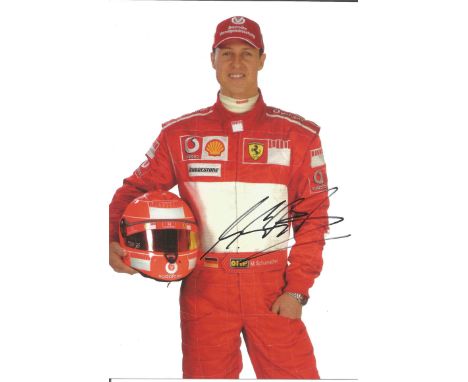 Michael Schumacher Ferrari F1 genuine authentic signed 8x6 colour photo. Good Condition. All signed pieces come with a Certif