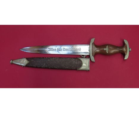 A Third Reich Era Sturmabteilung SA, (Brown Shirts) dagger with scabbard