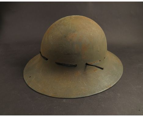 A WWII British Civil Defence Zuckermann helmet, dated 1941 to both helmet and liner