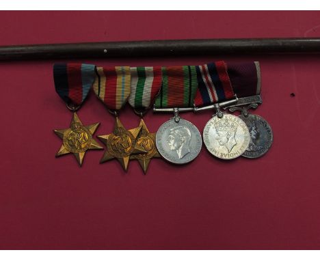 A WWII and later medal group consisting of 1939-45, Africa and Italy stars, Defence and War medal, together with LS & GC meda