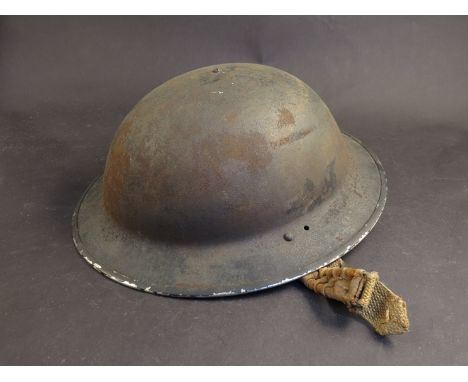 A WWII British Civil Defence helmet (blackened infantry), 1943 BMB