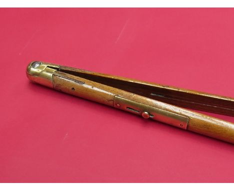 A c.1900 military pace stick with brass fittings