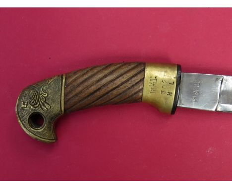 A 19th Century Russian Shashka cavalry sabre with leather covered and brass mounted scabbard fitted with bayonet 