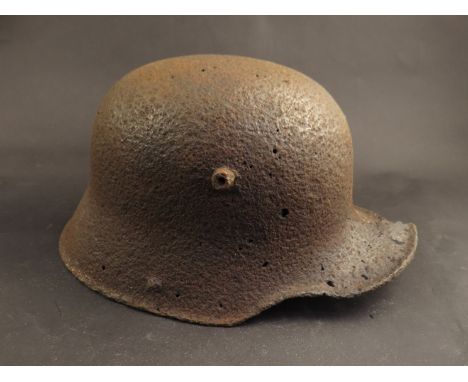 A WWI German battlefield find helmet